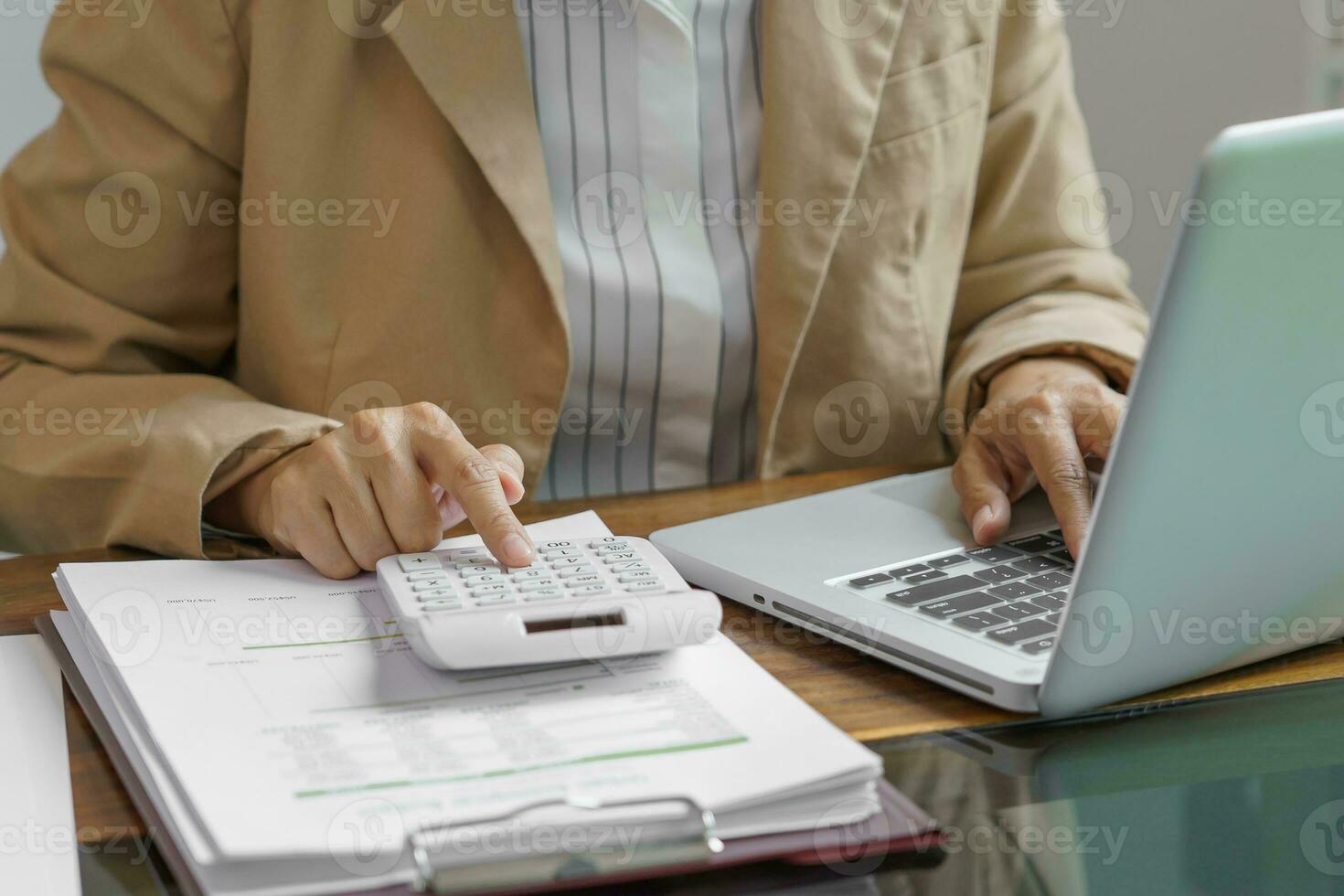 Calculating Cost Economic budget saving and investment concept analyzing investment charts and calculator Accounting Concept photo