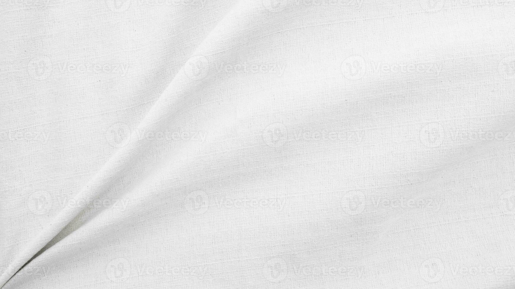 Organic Fabric cotton backdrop White linen canvas crumpled natural cotton fabric Natural handmade linen top view background  organic Eco textiles White Fabric linen texture photo