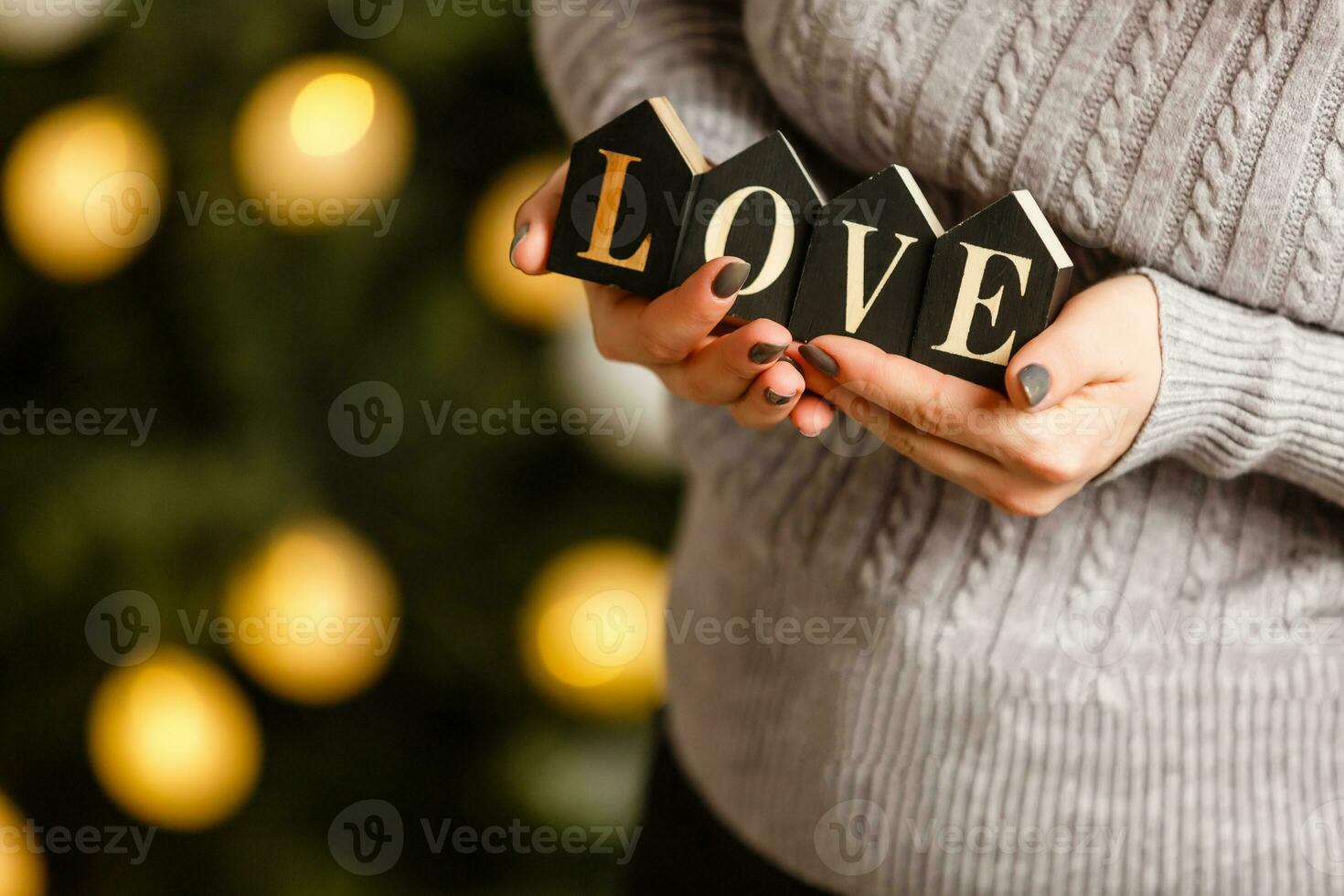 inscription love in the hands photo