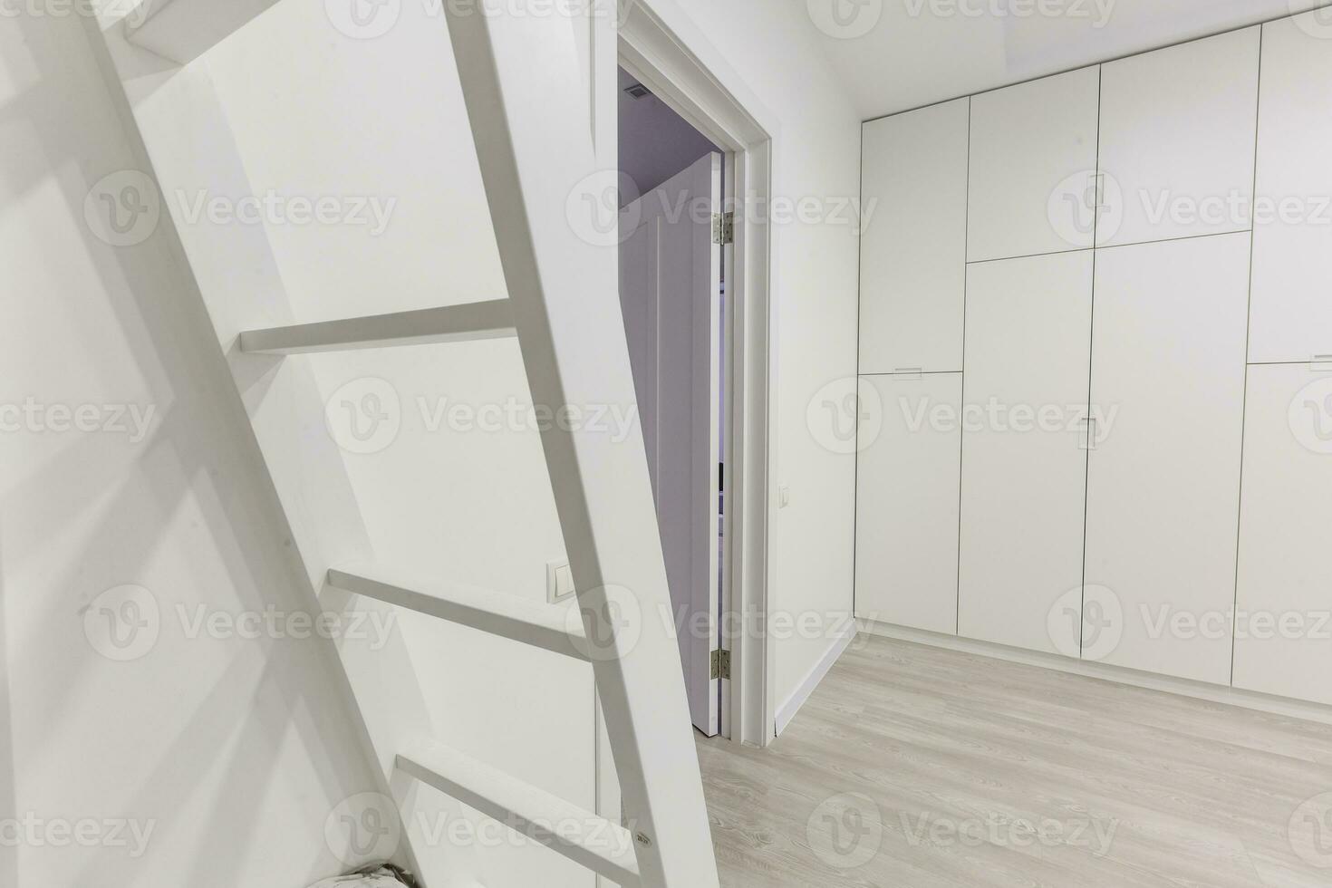 Child's room with white bed and Light color window photo