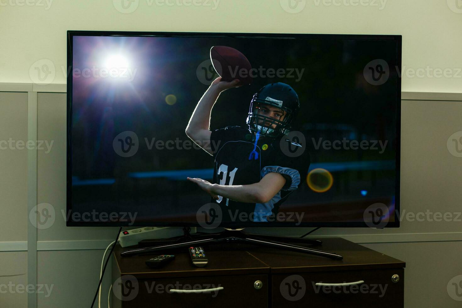 football match football on the big screen tv photo