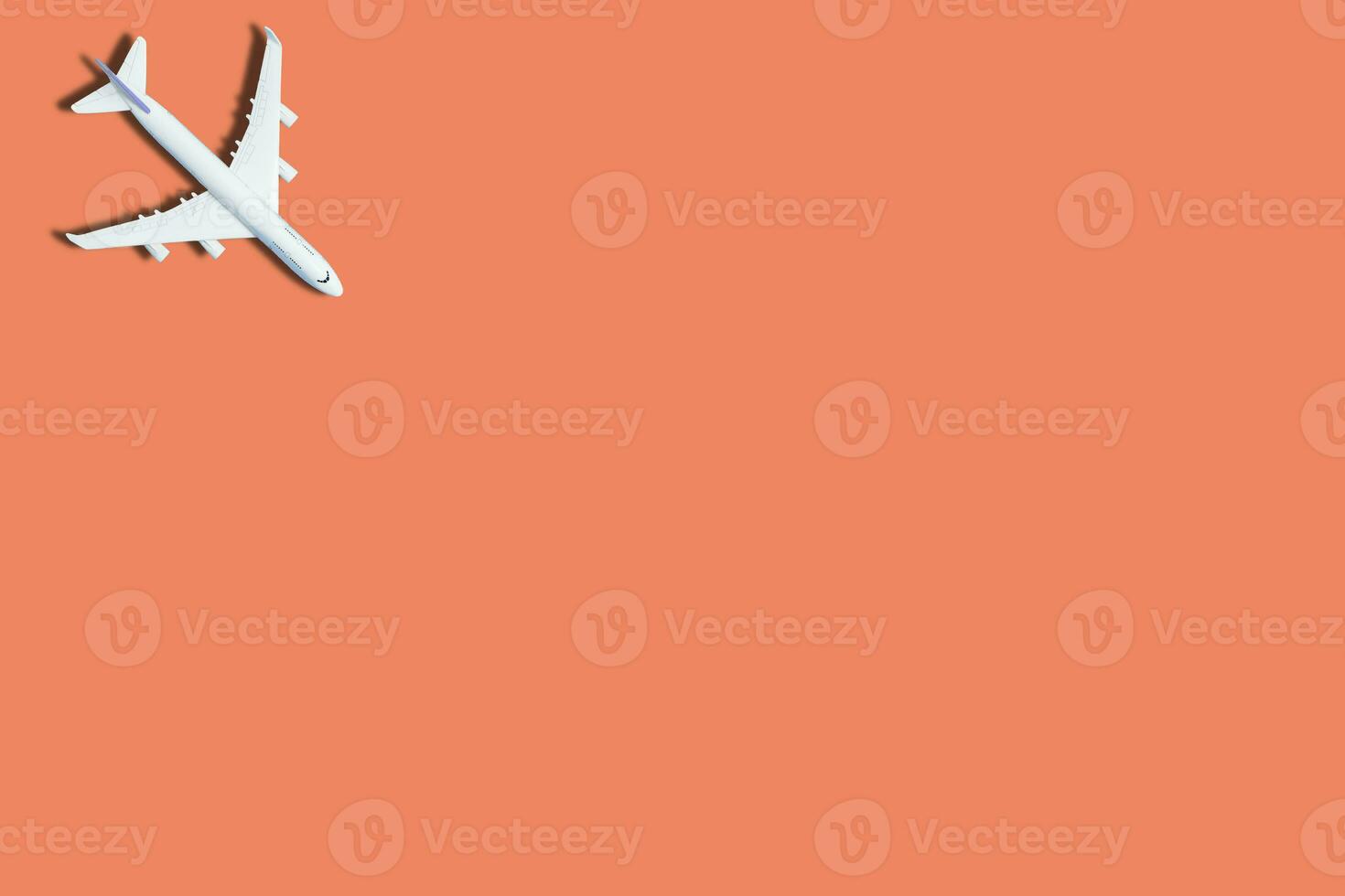 airplane figure on pink background photo