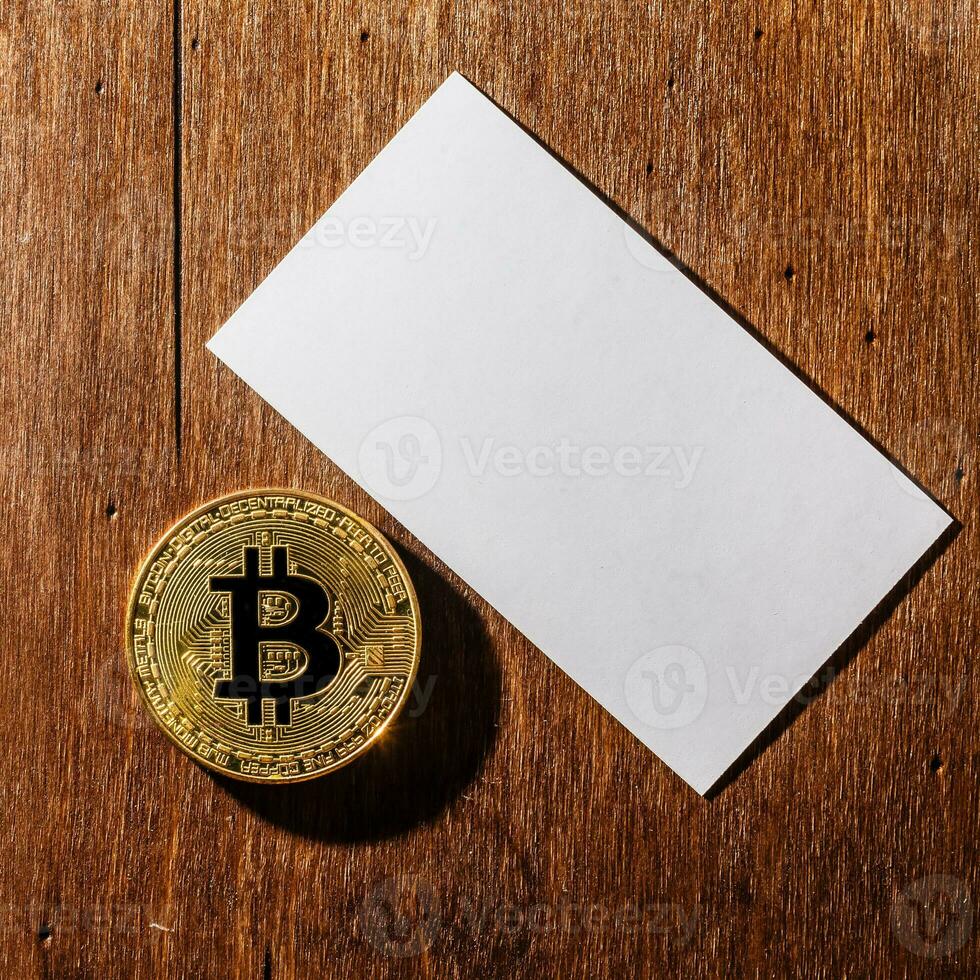 We accept bitcoins Business cards. Stack of blank horizontal business cards propped up another. photo
