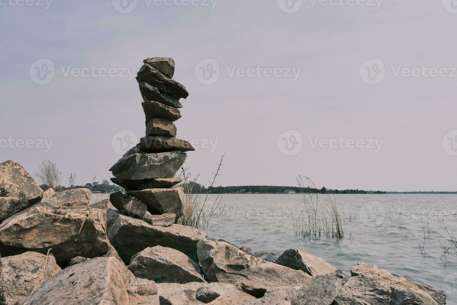 Stone stack, Nature landscape river bank photo