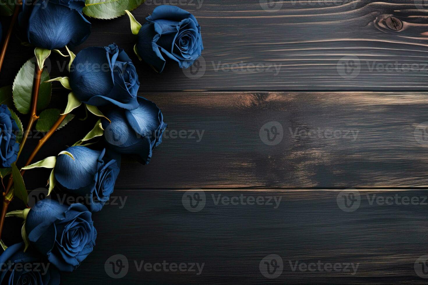 hermosa azul rosas en oscuro de madera antecedentes parte superior vista, floral modelo con Copiar espacio foto