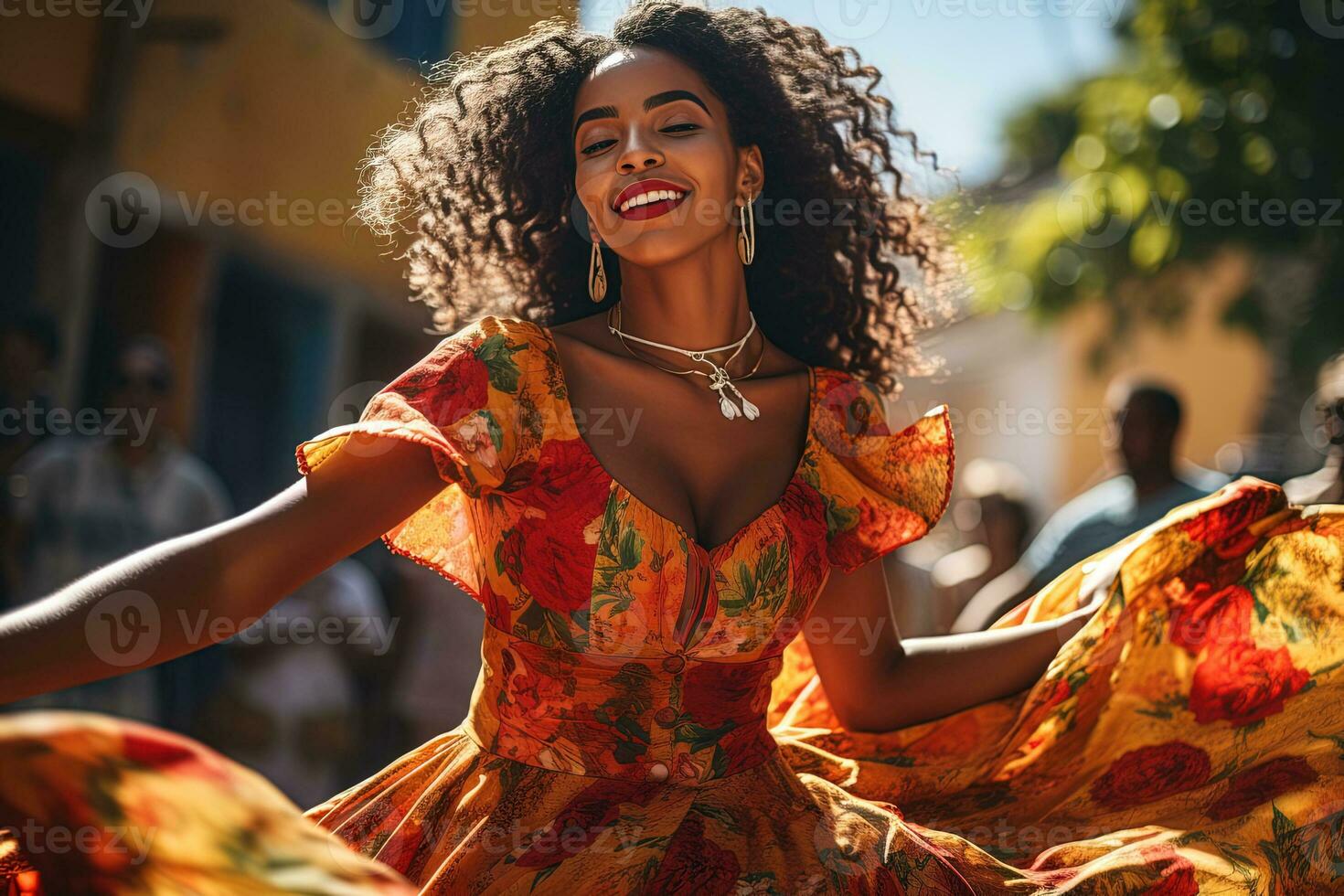 Young happy smiling beautiful woman dancing on caribbean city streets in bright dress photo