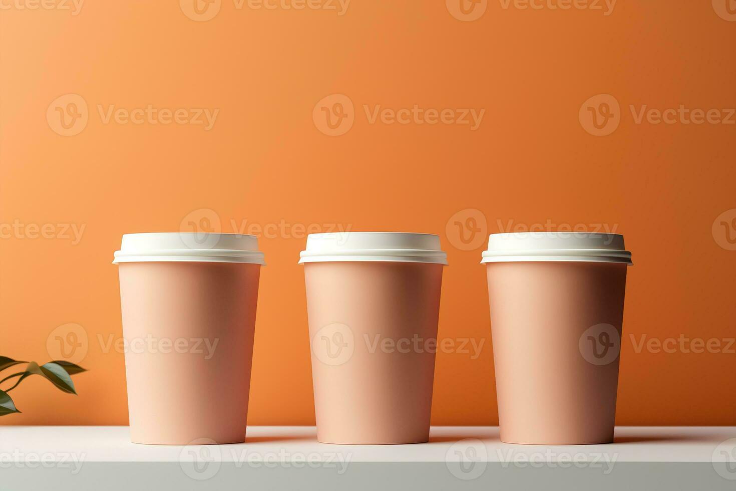 Three identical cardboard cups with white caps for coffee to go on a table on a beige background photo