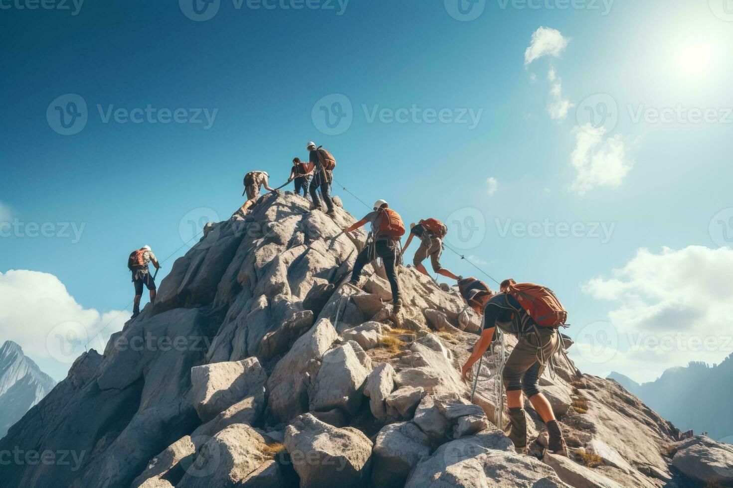 A group of climbers climbs to the top of the mountain. Travel and mountain hiking concept photo