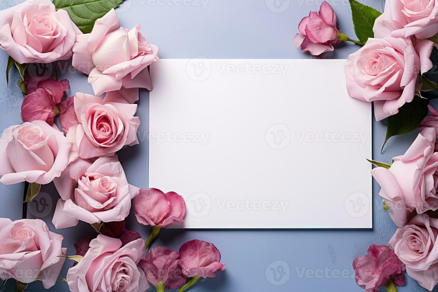 mockup white blank paper sheet with pink roses flowers top view on blue background, floral template empty card flat lay for design with copy space photo