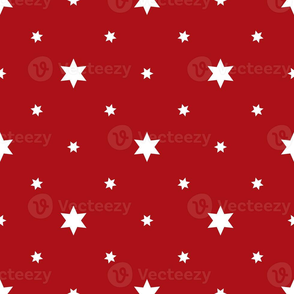 Seamless pattern of white stars on a red background photo