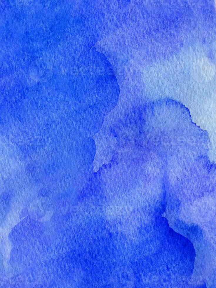 Blue watercolor background with spots, dots, blurred circles photo