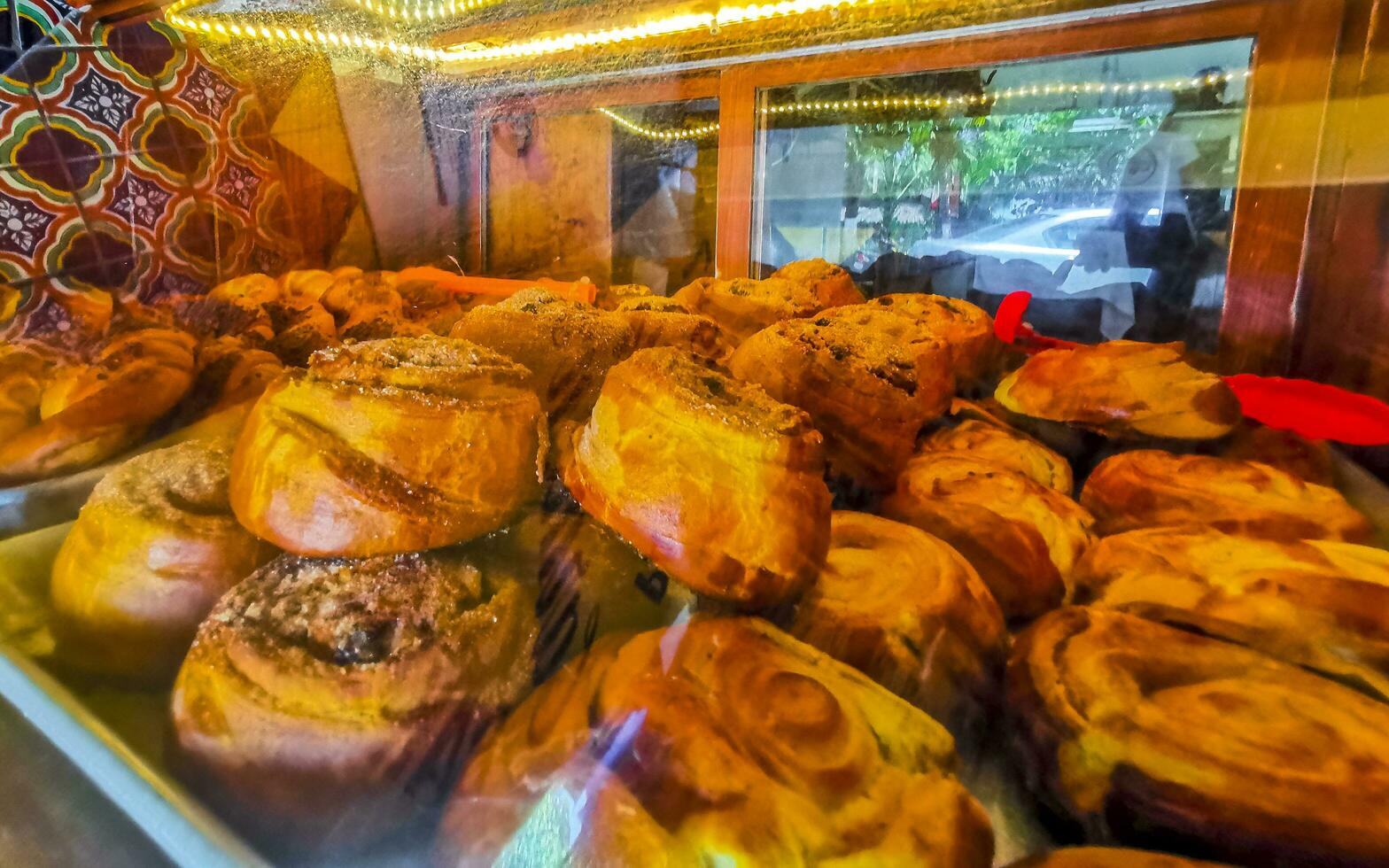Bread rolls baguettes cakes and other pastries in Mexico. photo