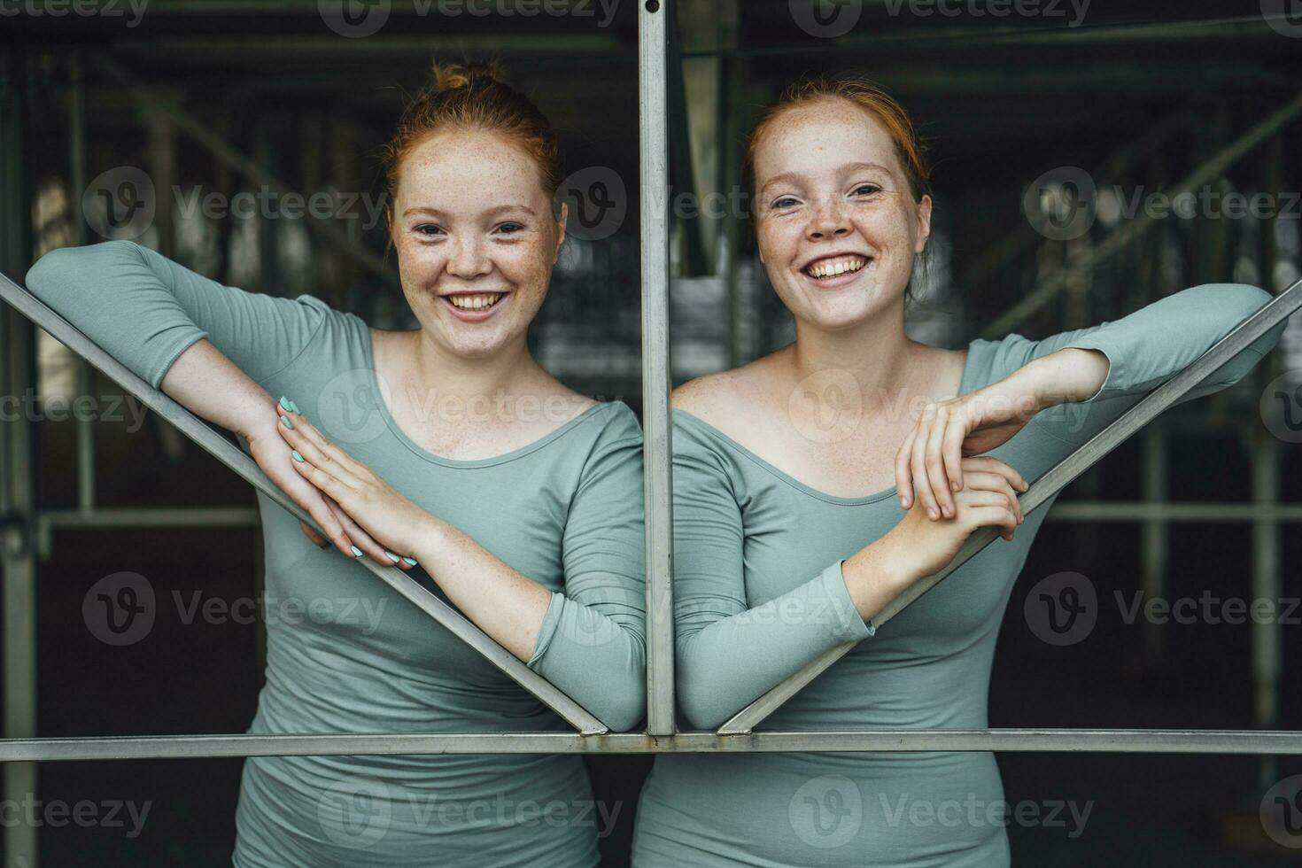 Laughing redheaded twins photo