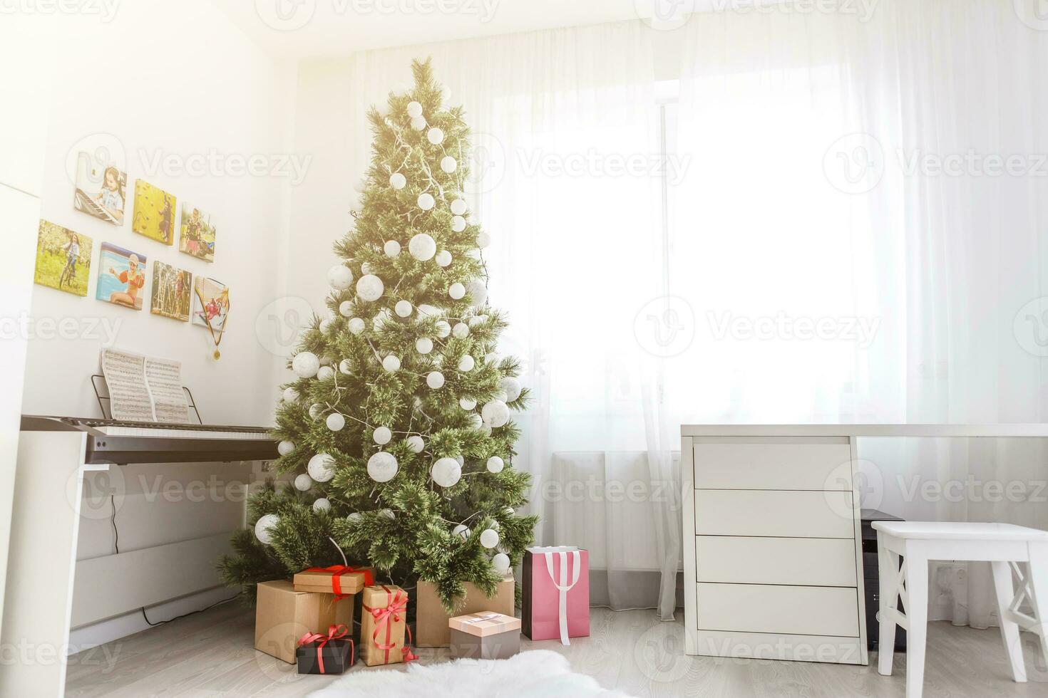 christmas room interior tree decorated by lights gifts toys candles holiday concept photo