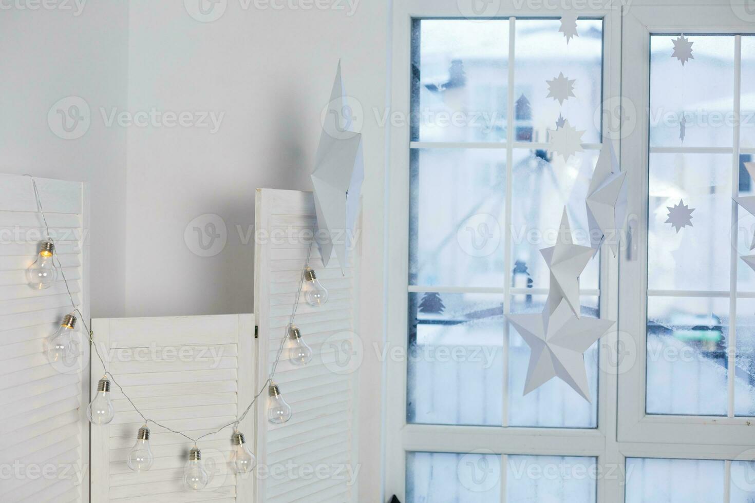 winter decor with candles and garland photo