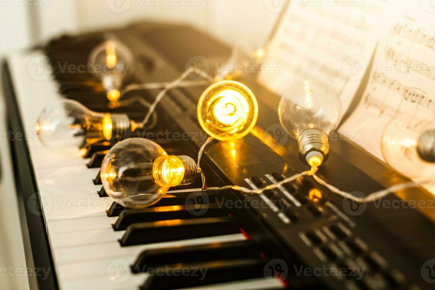 Synthesizer, piano, piano keys close-up, blurred background, colorful bokeh, musical instruments, new year, Christmas, Christmas concert photo