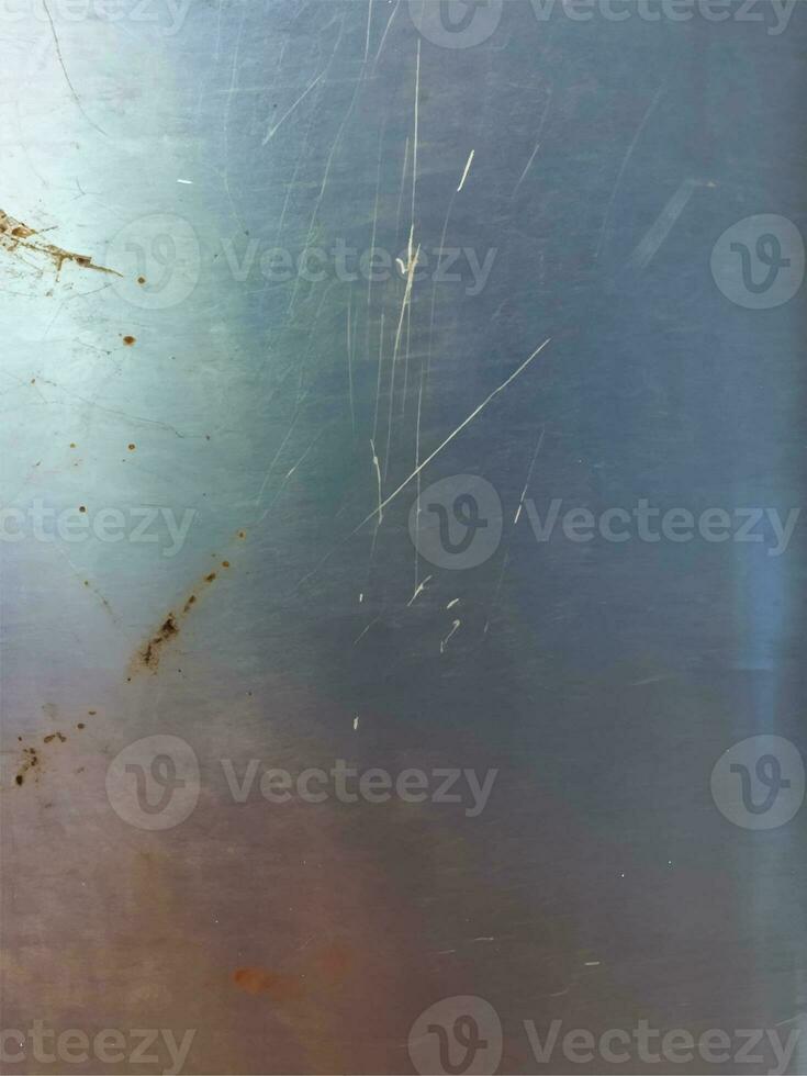 Metal texture with dust scratches and cracks. photo