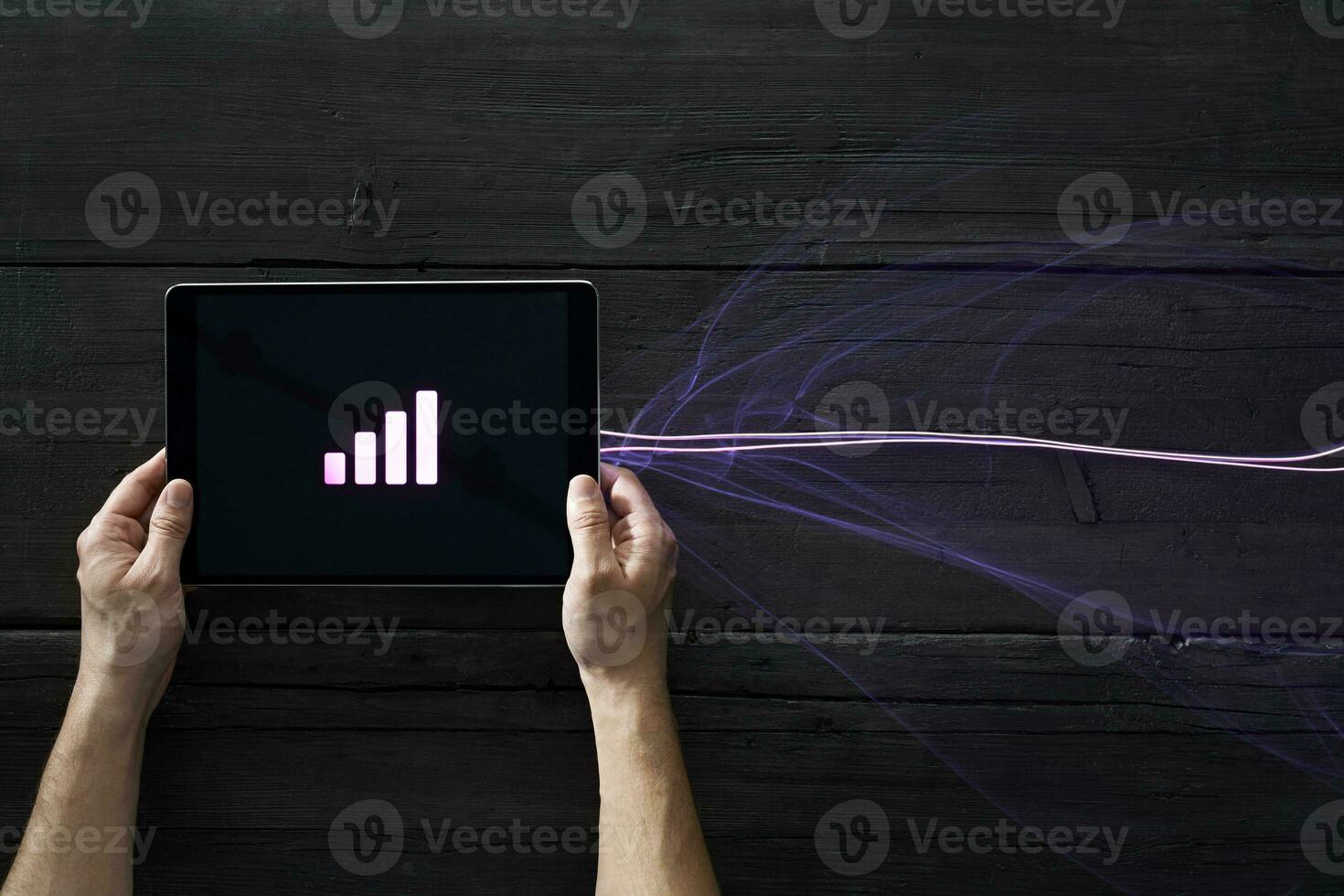 Man connecting to network with his smartphone photo