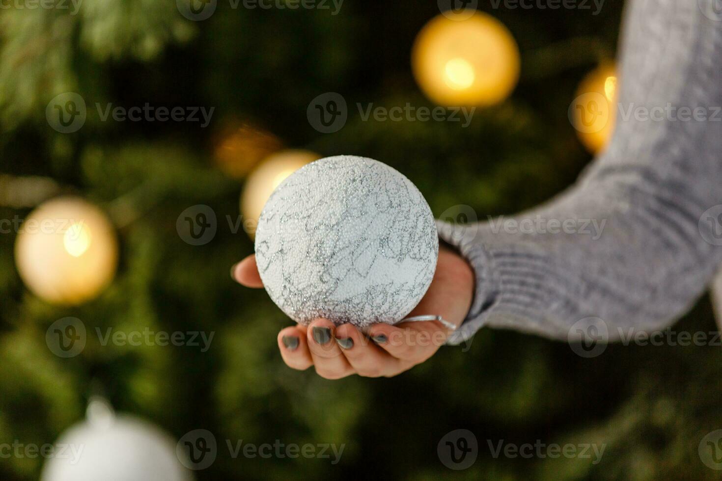 Christmas tree toys in the hands photo