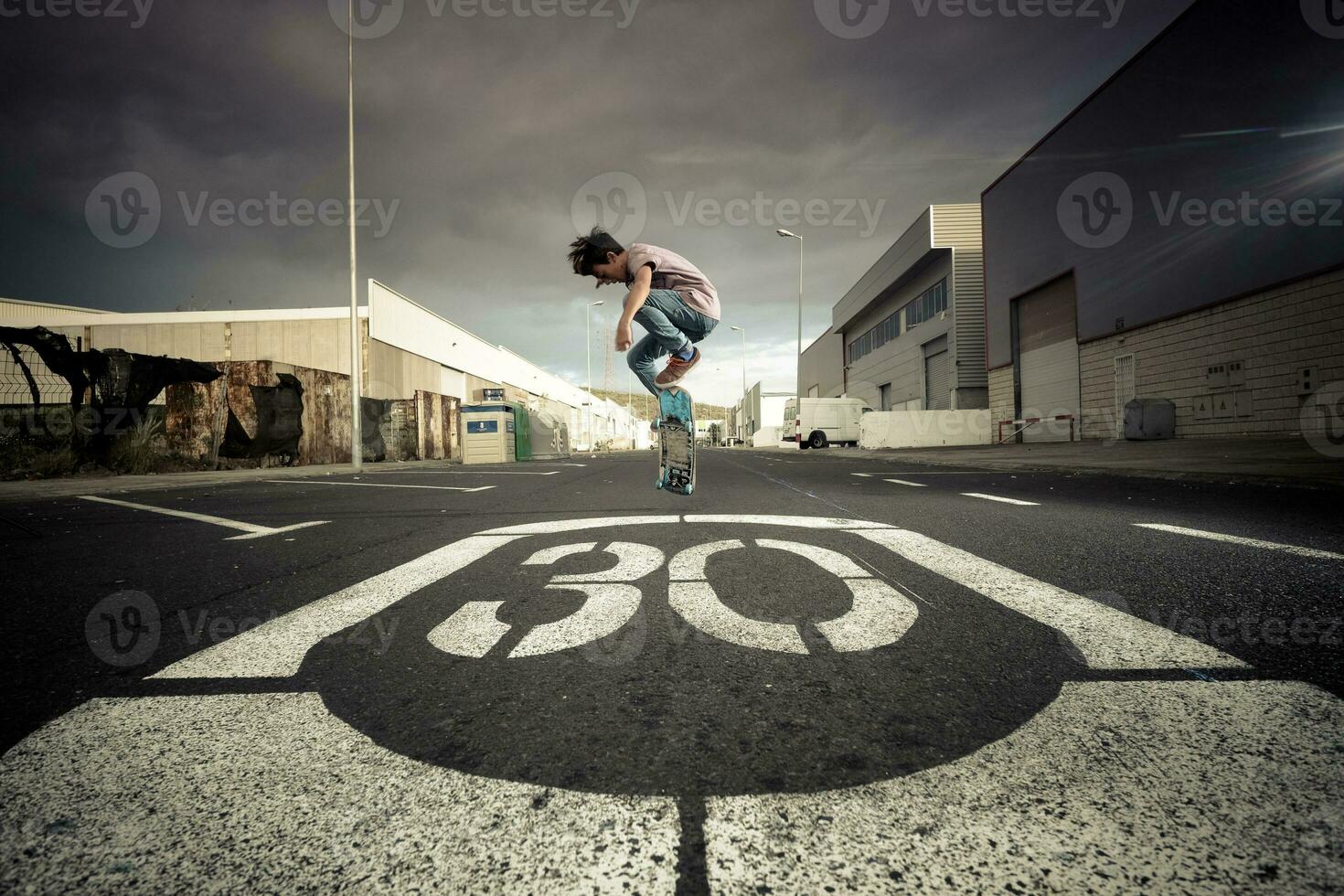 Spain, Tenerife, boy skating on a road photo