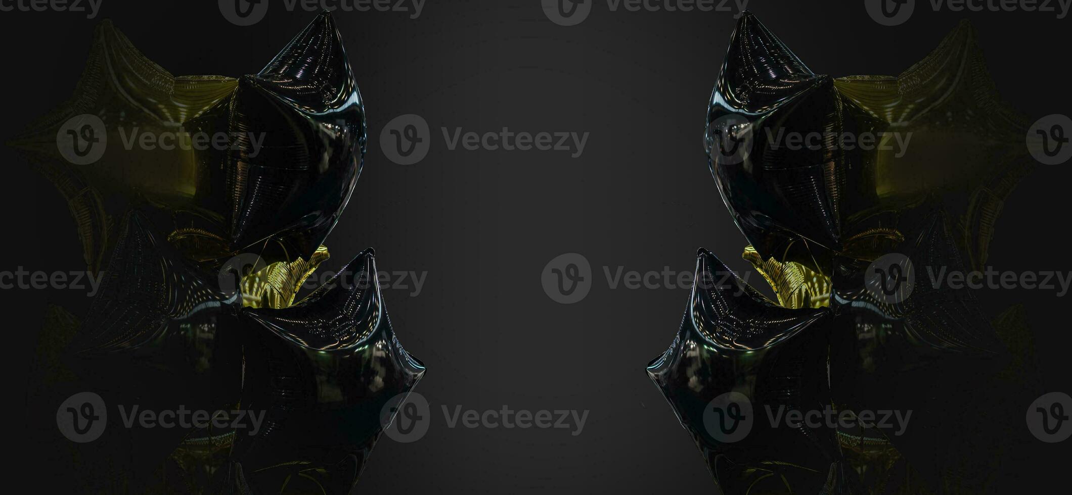 A group of black and gold balloons on a black background with copy space photo