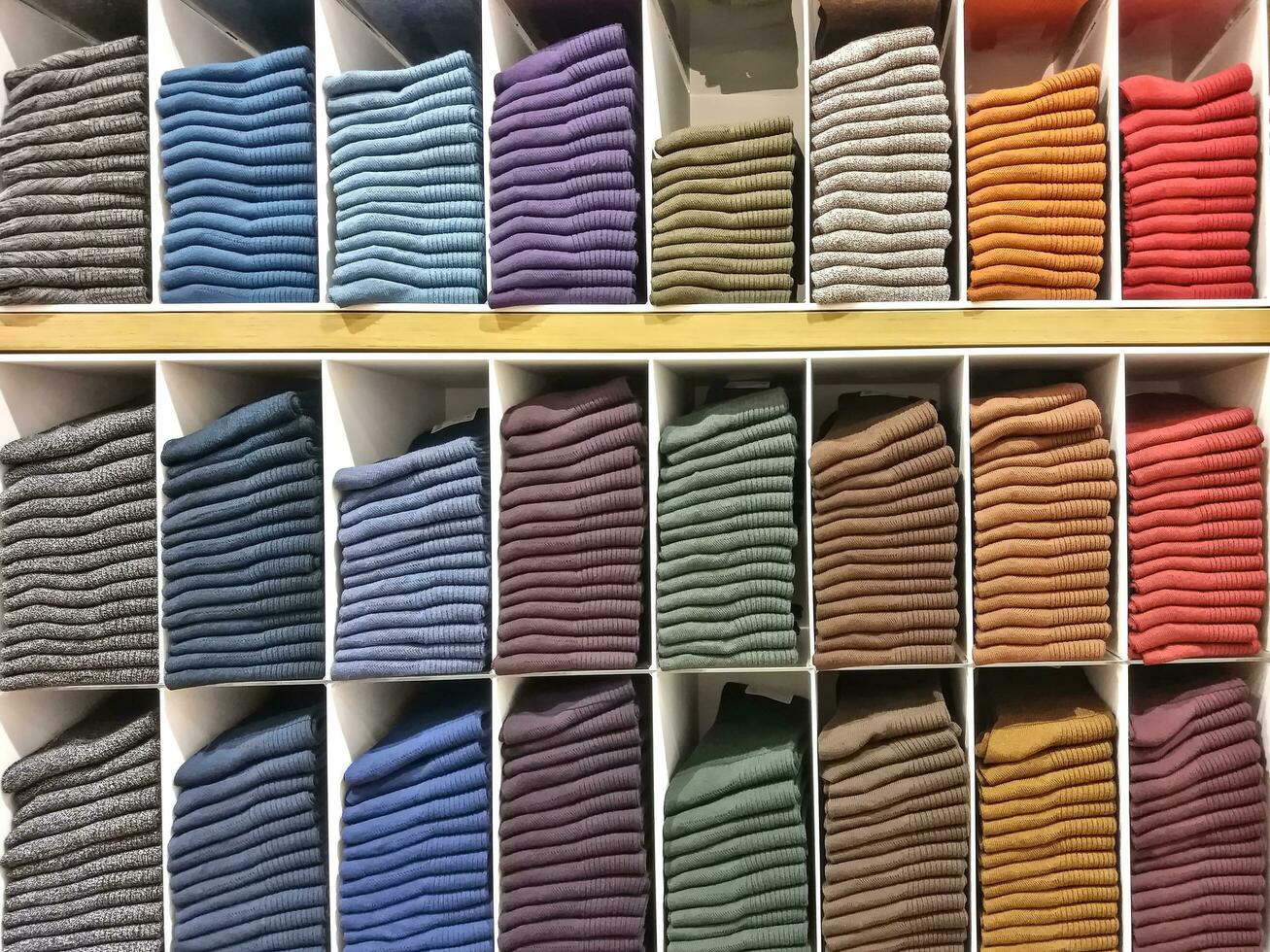 The fabric is folded by the seller. Placed in a showcase to make it easy for customers to buy. photo