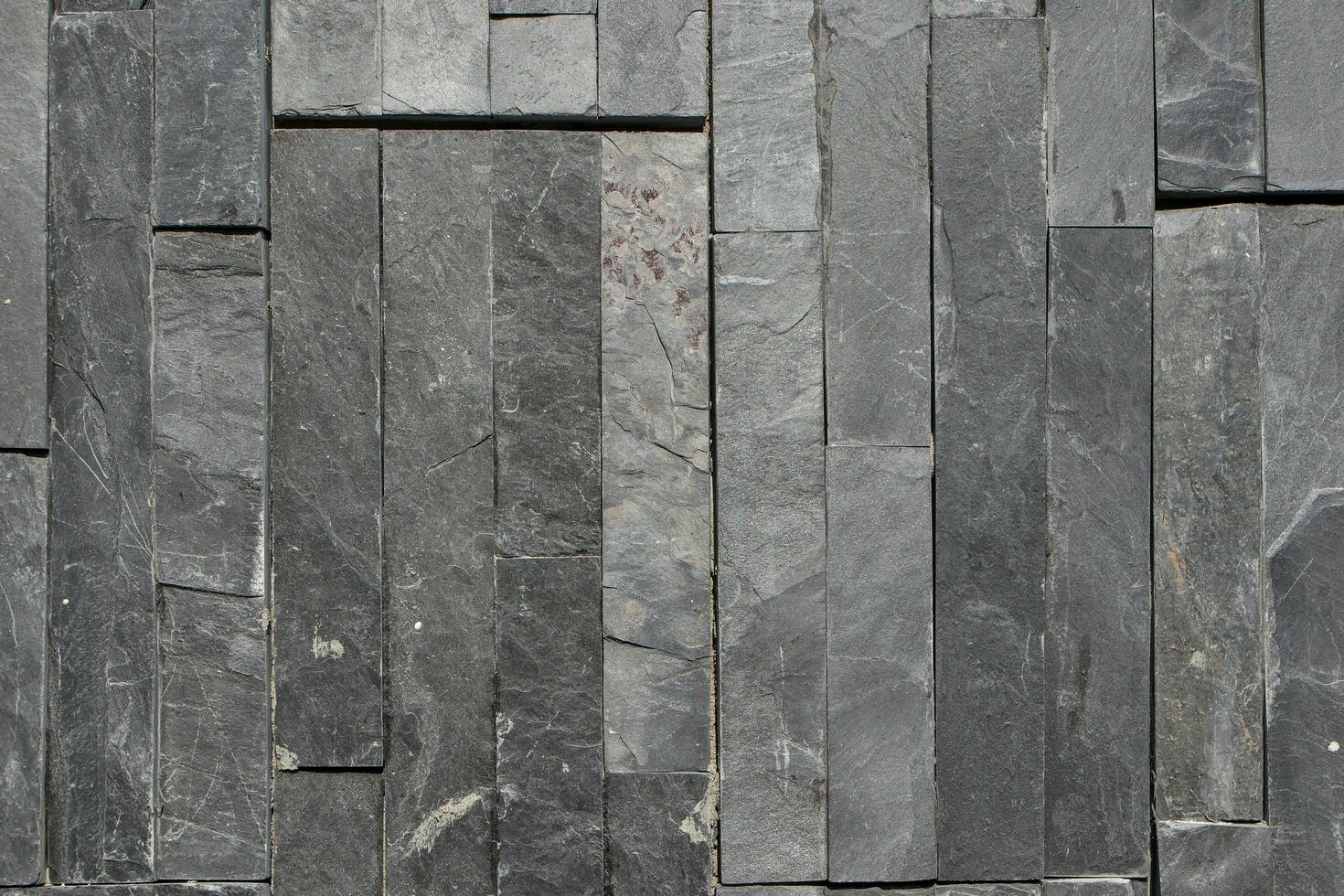 The background image of the wall cladding stone, also known as the puzzle stone. photo