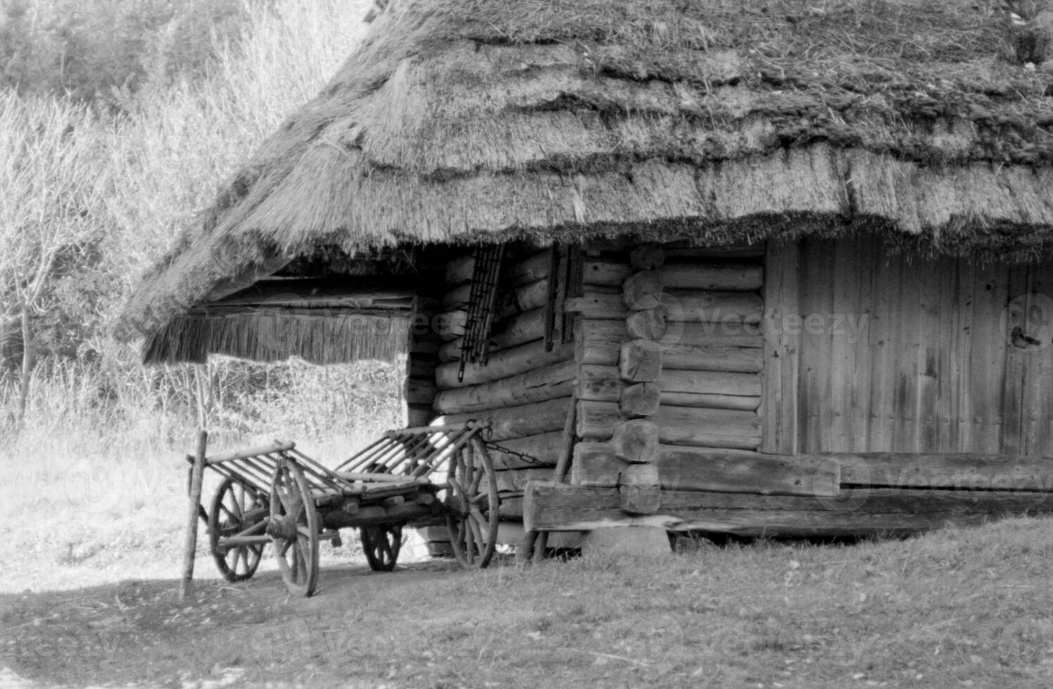 Photo on theme of old wooden hut without windows