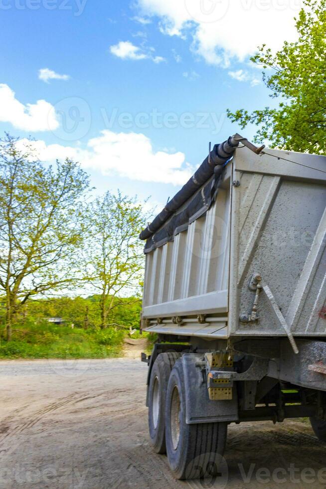 Truck trailer parked at the forest edge in Germany. photo