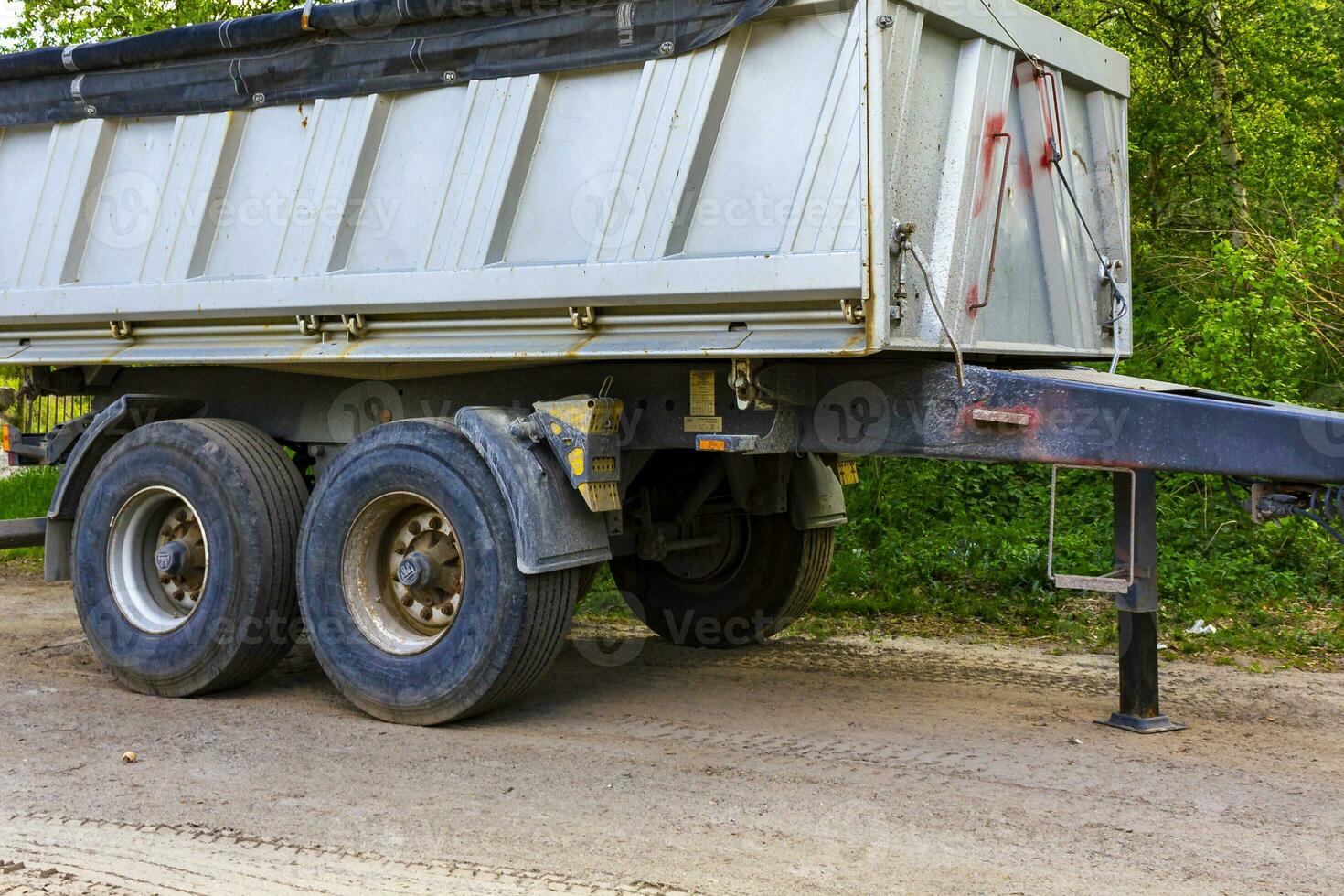 Truck trailer parked at the forest edge in Germany. photo