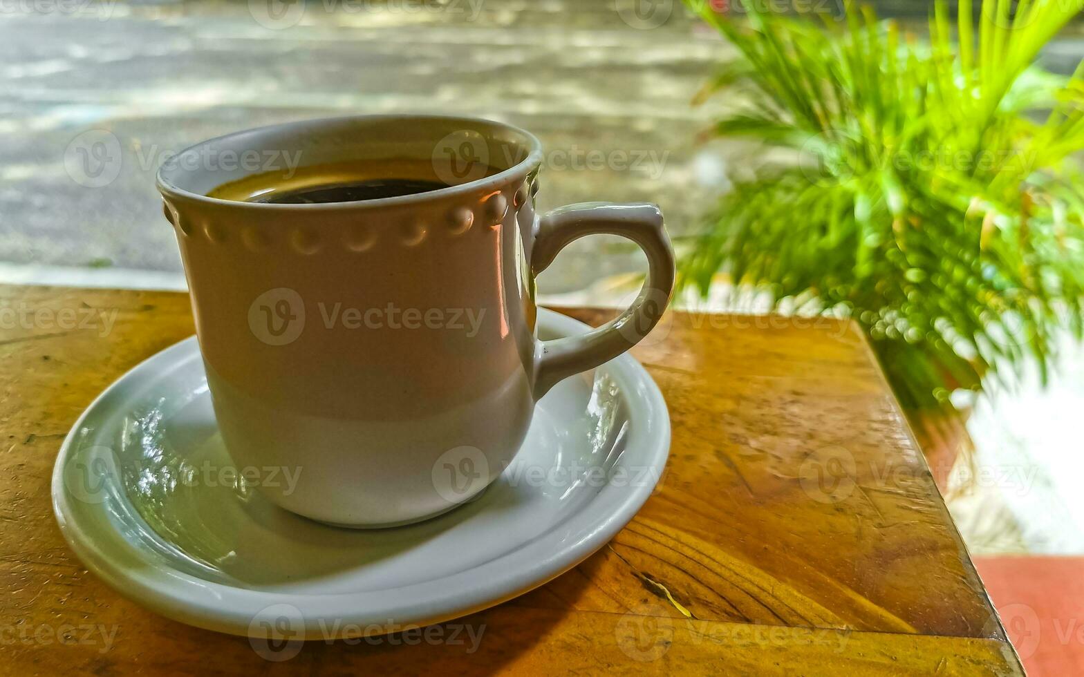 Cup of americano black coffee in restaurant cafe in Mexico. photo