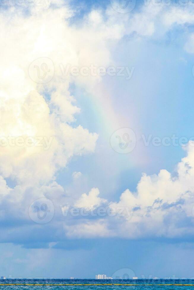 Tropical mexican beach rainbow turquoise water Playa del Carmen Mexico. photo