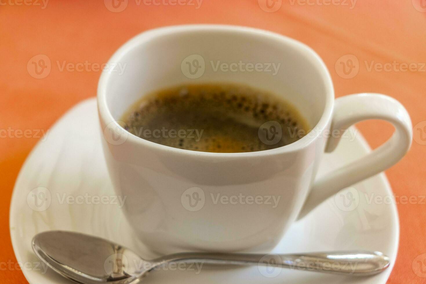 Cup with black coffee in resort Rasdhoo Atoll island Maldives. photo