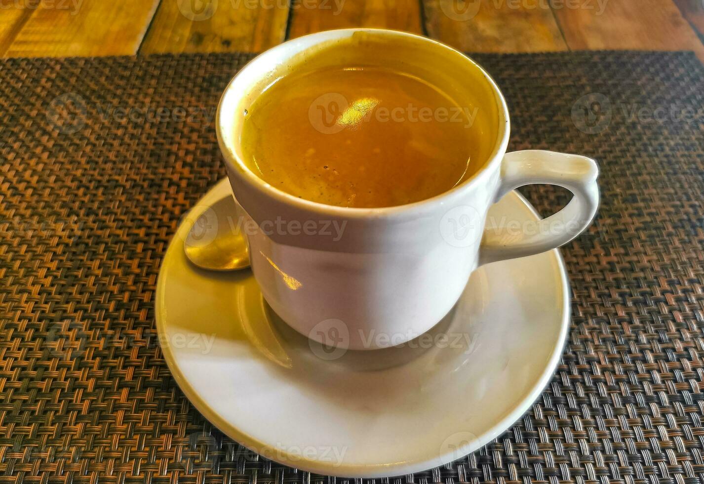 Cup of americano black coffee in restaurant cafe in Mexico. photo