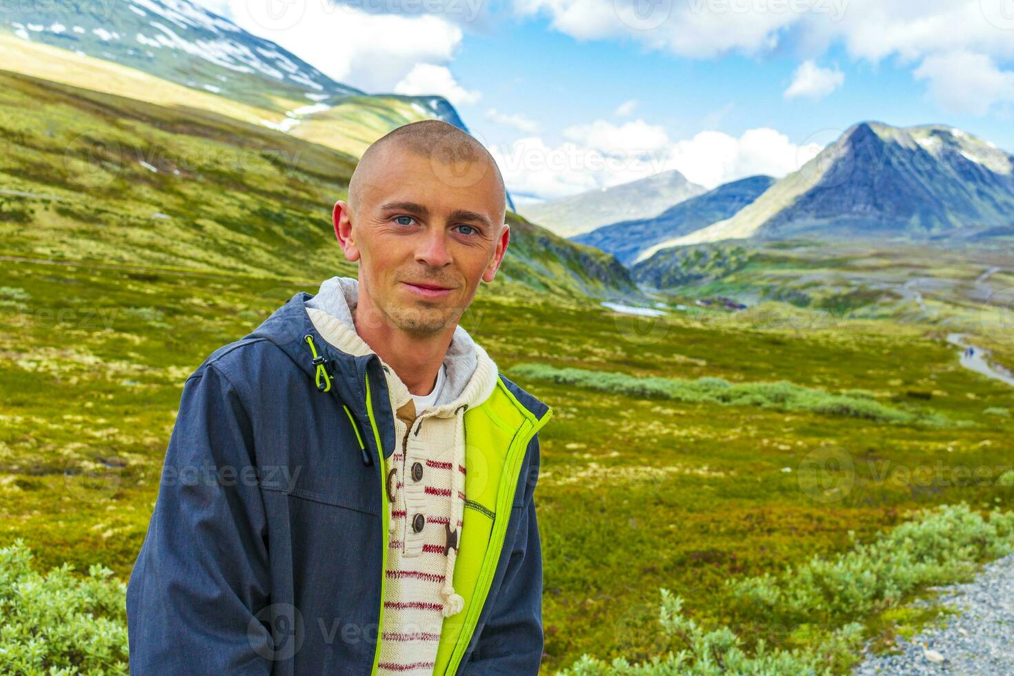 Young hiker and mountains landscape panorama Rondane National Park Norway. photo