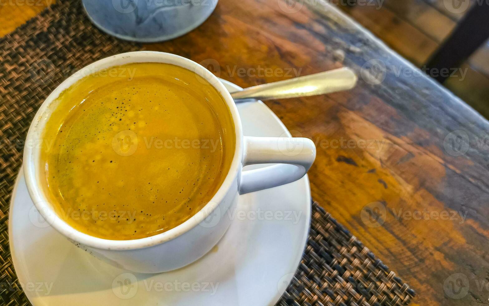 Cup of americano black coffee in restaurant cafe in Mexico. photo