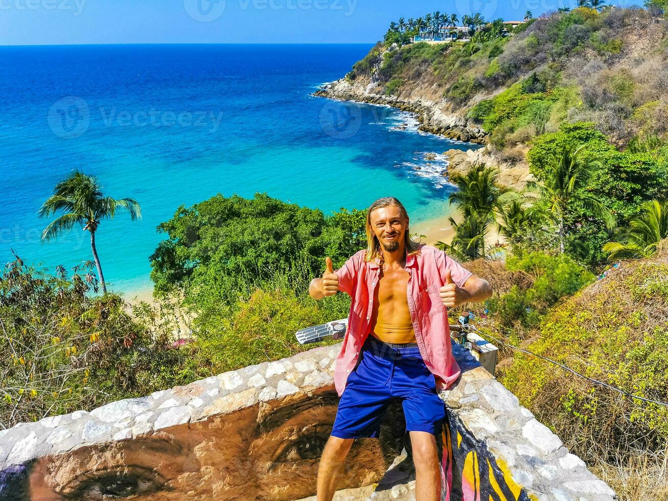 Selfie rocks cliffs view waves Carrizalillo beach Puerto Escondido Mexico. photo