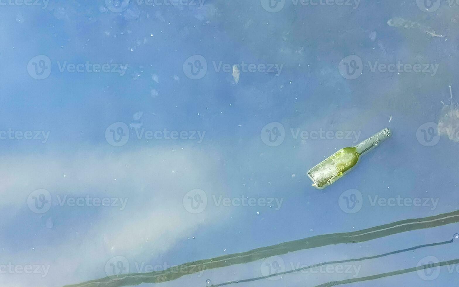 Dirty green polluted and garbage river in Puerto Escondido Mexico. photo