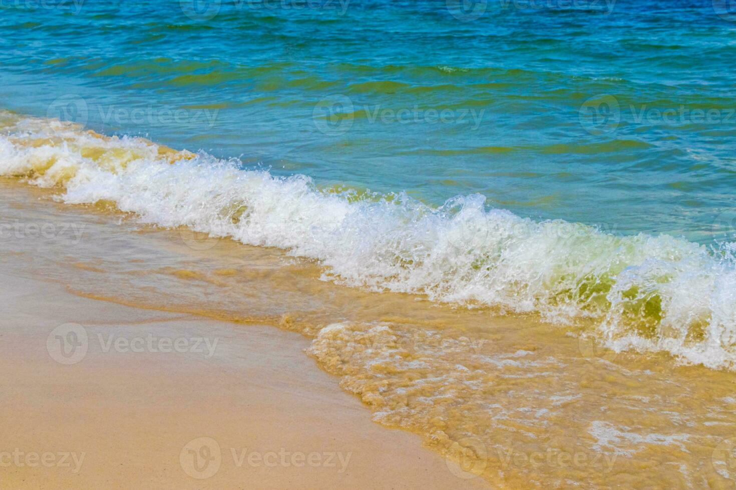 Waves at tropical beach caribbean sea clear turquoise water Mexico. photo