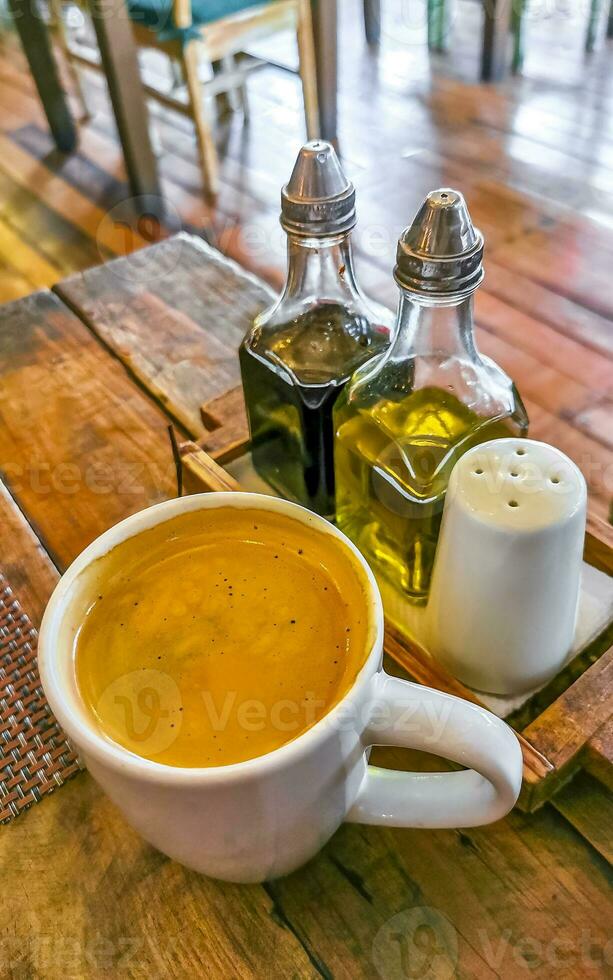 Cup of americano black coffee in restaurant cafe in Mexico. photo