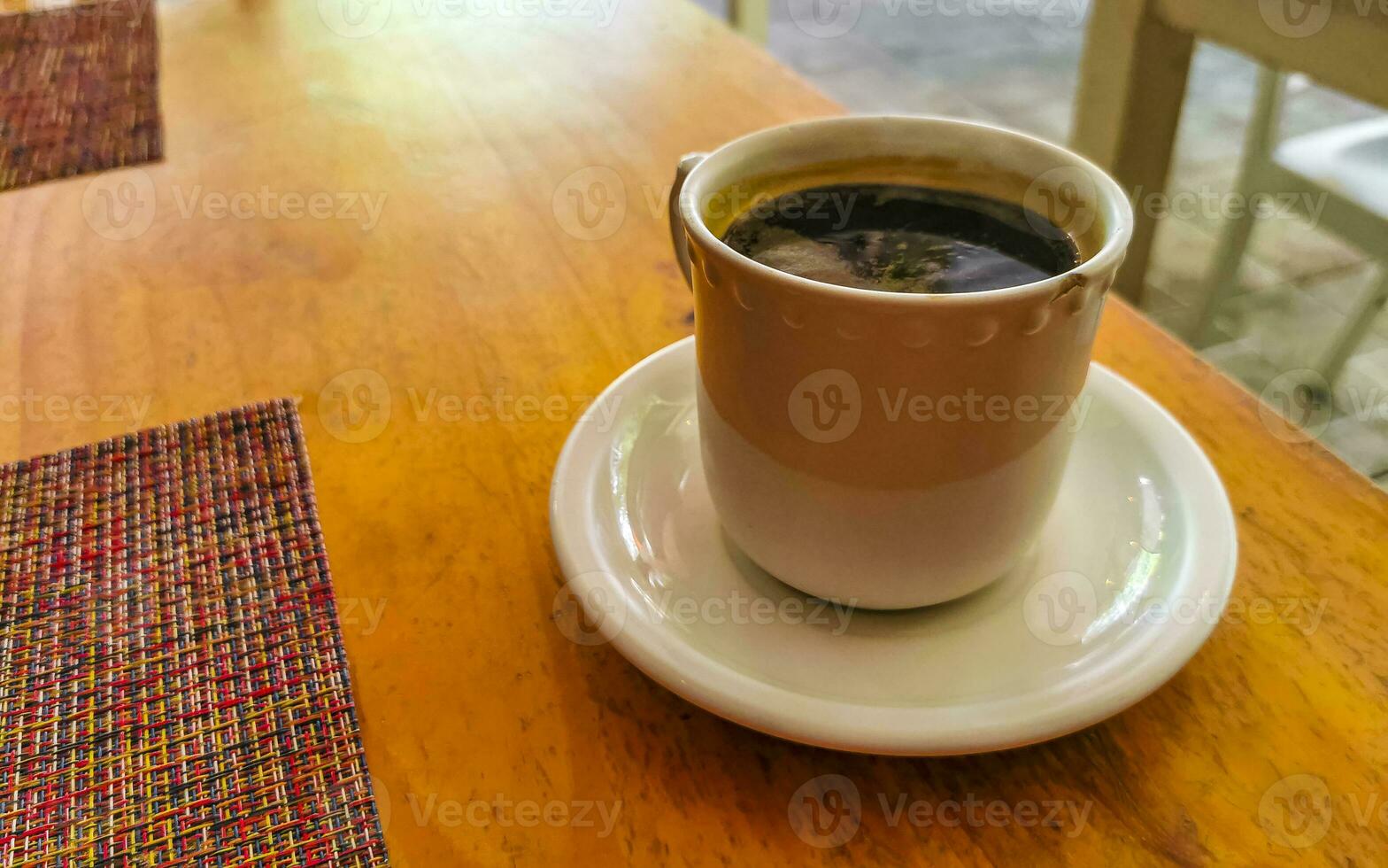 Cup of americano black coffee in restaurant cafe in Mexico. photo