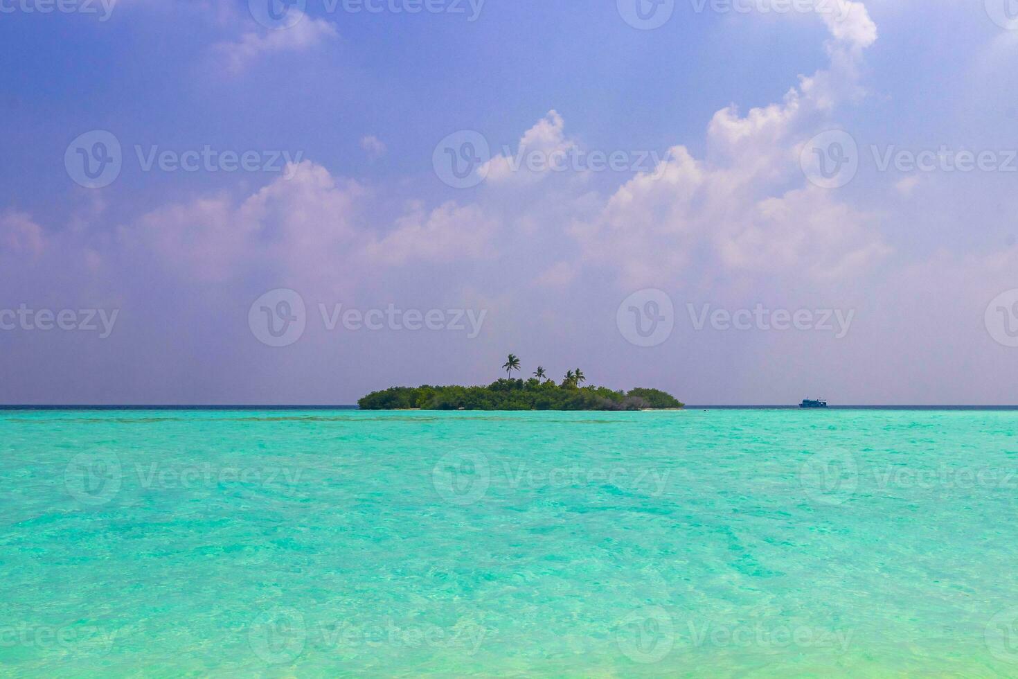 Rasdhoo island view from tropical sandbank islands Madivaru Finolhu Maldives. photo