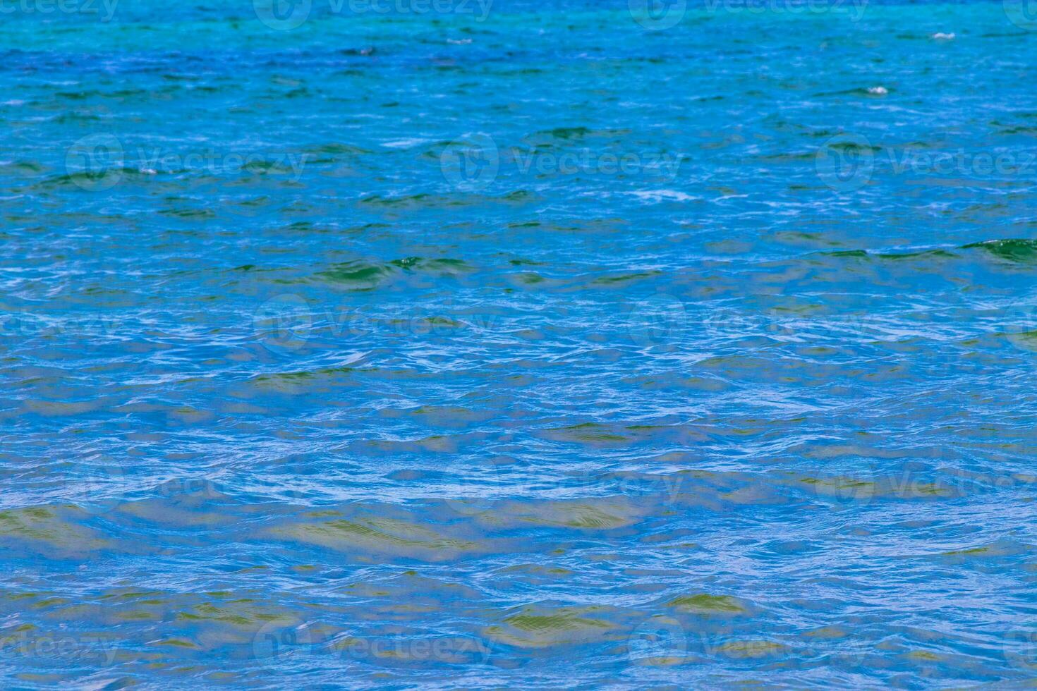 Waves at tropical beach caribbean sea clear turquoise water Mexico. photo