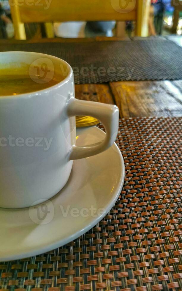 Cup of americano black coffee in restaurant cafe in Mexico. photo