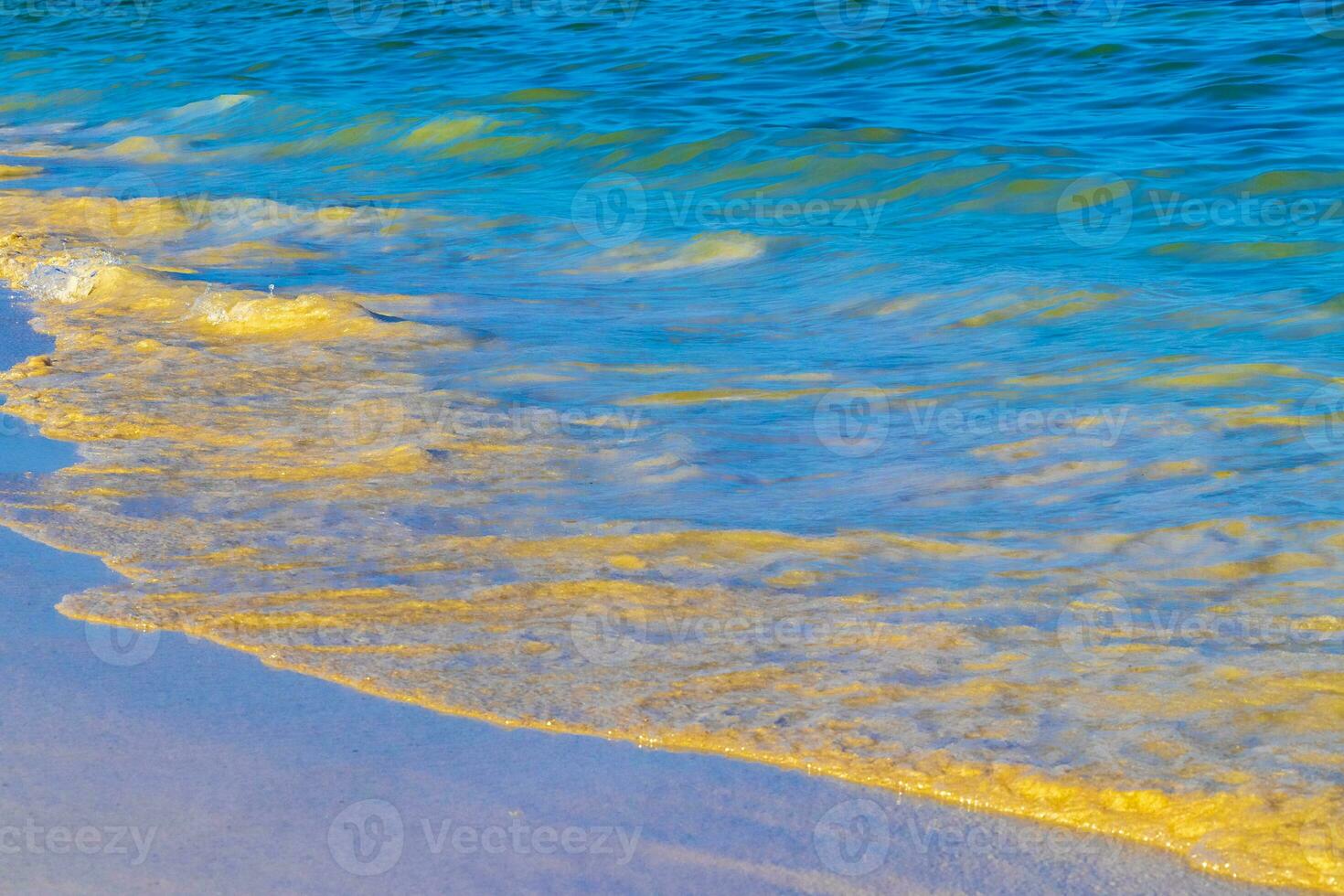 Waves at tropical beach caribbean sea clear turquoise water Mexico. photo