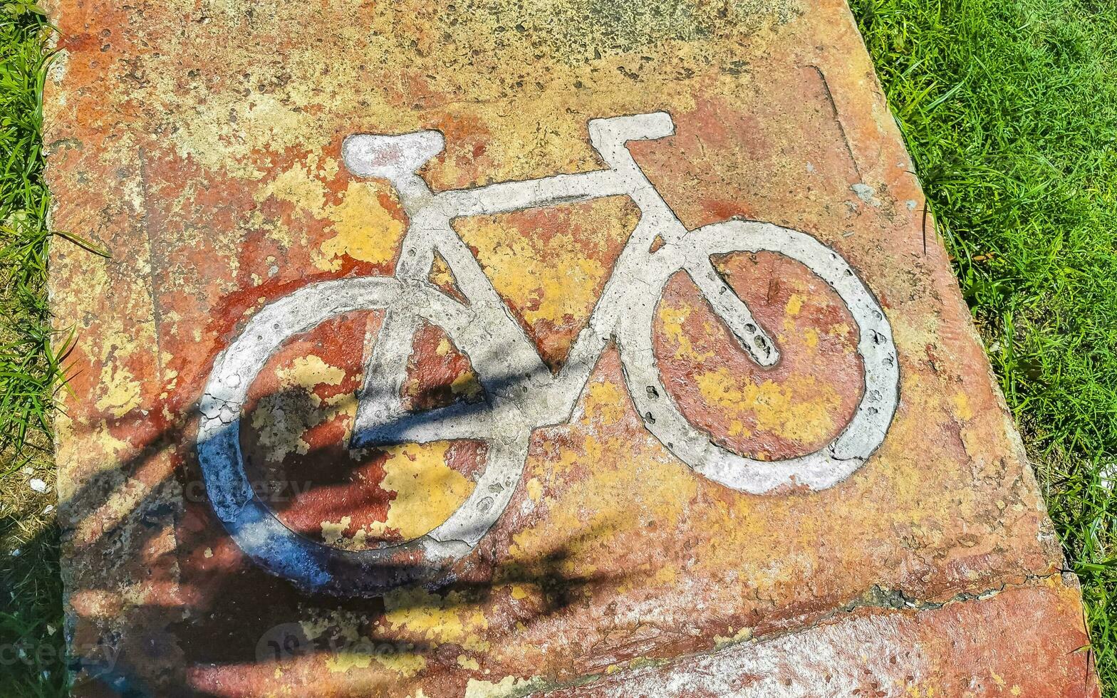 Bicycle symbol sign on ground of a bicycle lane Mexico. photo