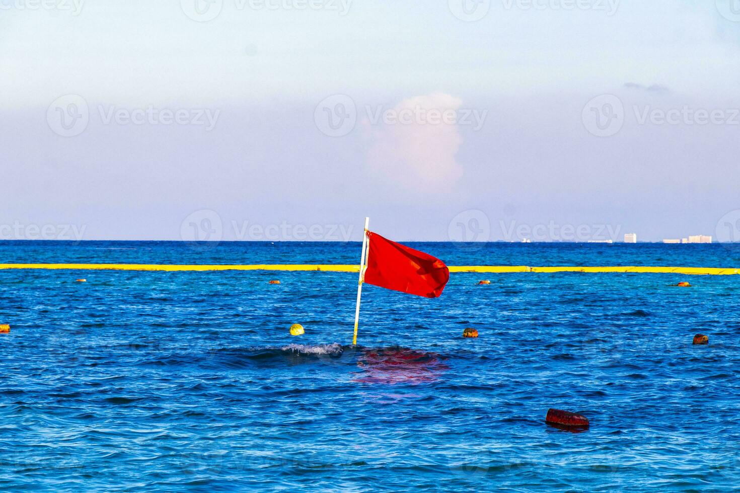 Red flag swimming prohibited high waves Playa del Carmen Mexico. photo