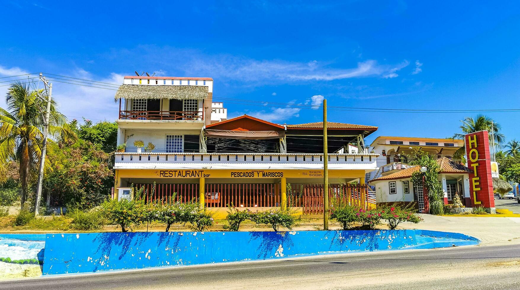 Puerto Escondido Oaxaca Mexico 2023 Typical beautiful colorful tourist street sidewalk city Puerto Escondido Mexico. photo