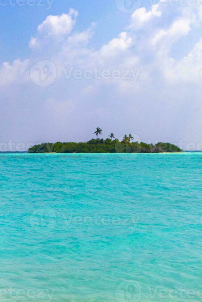 Rasdhoo island view from tropical sandbank islands Madivaru Finolhu Maldives. photo