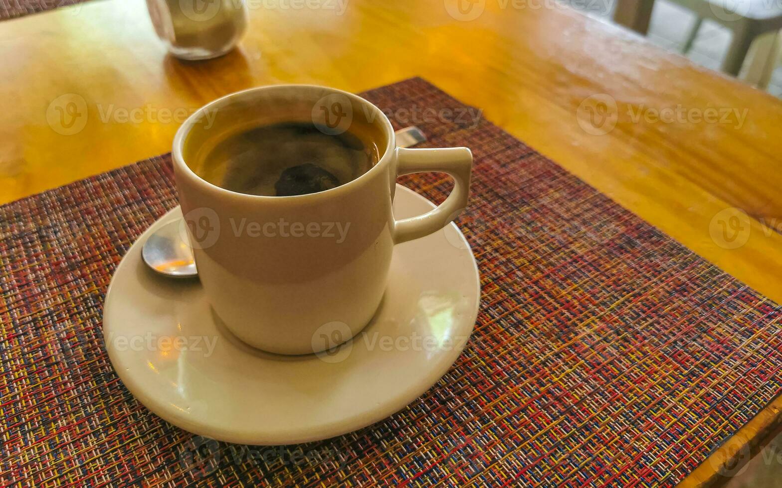Cup of americano black coffee in restaurant cafe in Mexico. photo